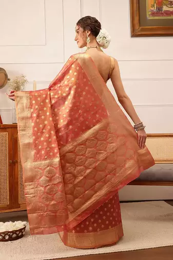 Pink woven tissue party wear saree with blouse piece
