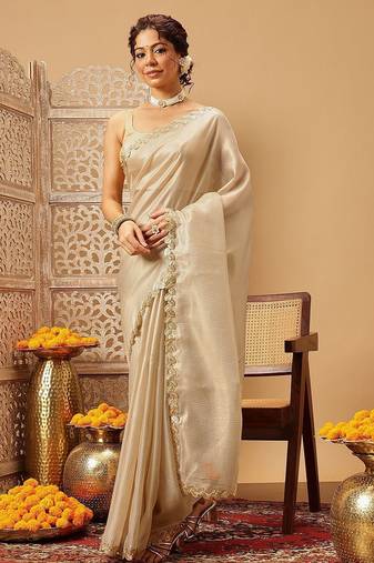 Beige plain silk cotton party wear saree with blouse piece