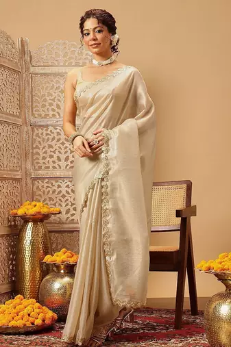 Beige plain silk cotton party wear saree with blouse piece