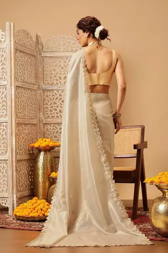 Beige plain silk cotton party wear saree with blouse piece