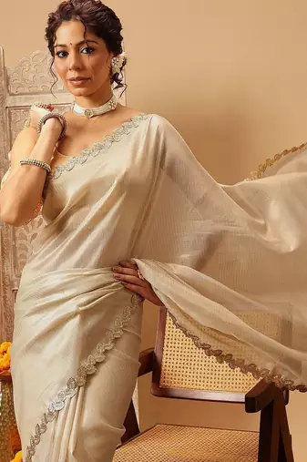 Beige plain silk cotton party wear saree with blouse piece