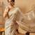 Beige plain silk cotton party wear saree with blouse piece