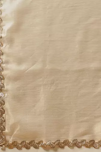 Beige plain silk cotton party wear saree with blouse piece