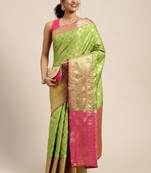 Green woven cotton blend traditional saree with blouse piece