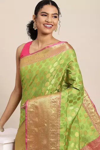 Green woven cotton blend traditional saree with blouse piece