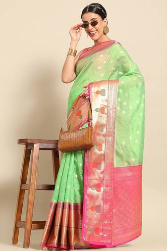 Green woven art silk traditional saree with blouse piece