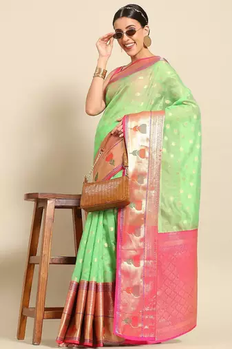 Green woven art silk traditional saree with blouse piece