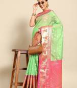 Green woven art silk traditional saree with blouse piece