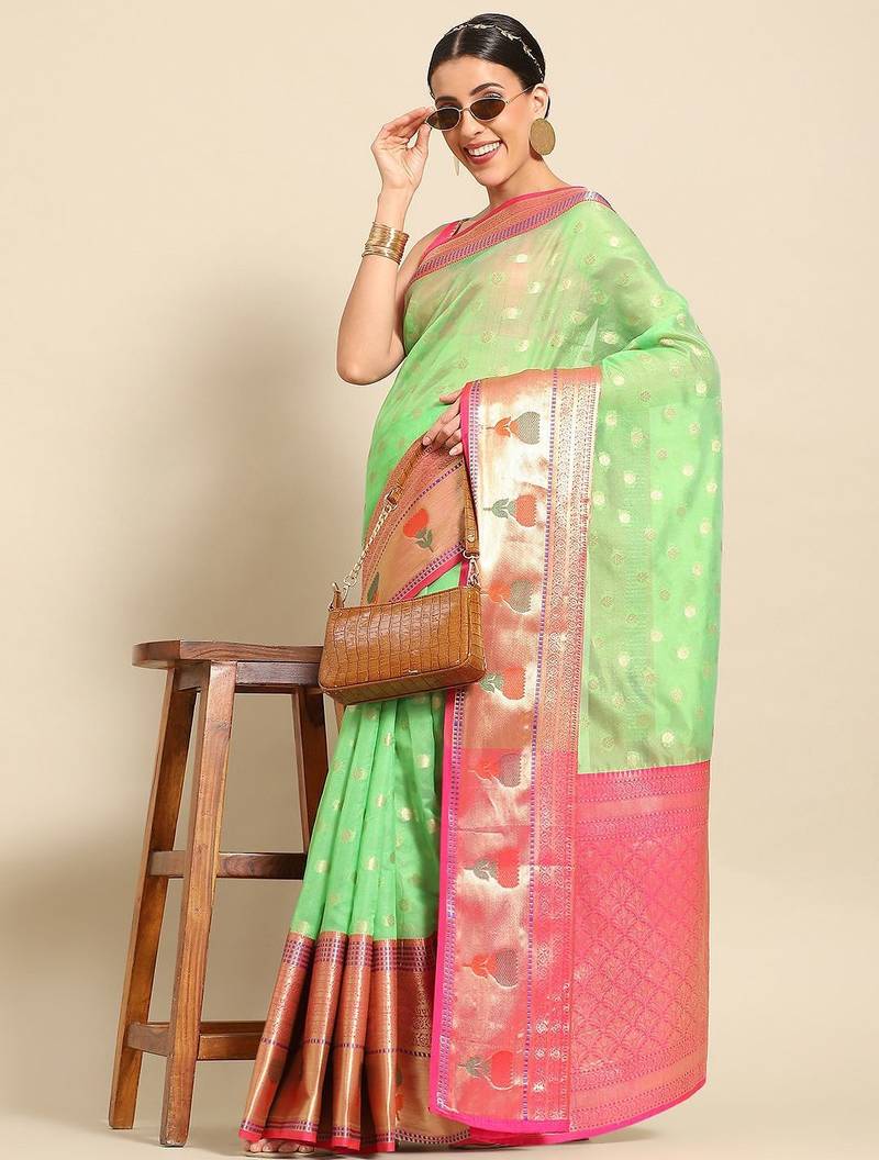 Green woven art silk traditional saree with blouse piece