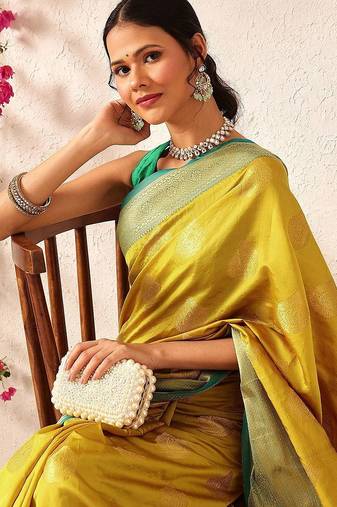 Yellow woven silk blend ethnic saree with blouse piece
