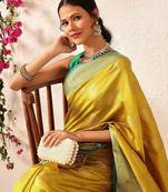 Yellow woven silk blend ethnic saree with blouse piece