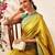 Yellow woven silk blend ethnic saree with blouse piece
