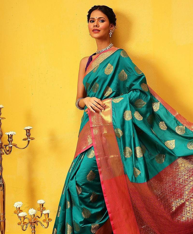 Teal woven silk blend ethnic saree with blouse piece