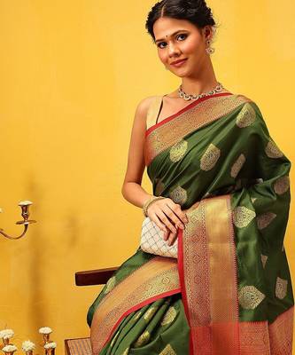 Green woven silk blend ethnic saree with blouse piece 1