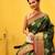 Green woven silk blend ethnic saree with blouse piece