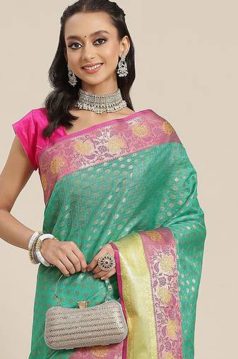 Green woven art silk traditional saree with blouse piece