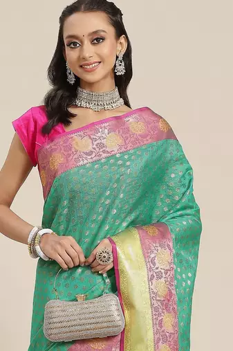 Green woven art silk traditional saree with blouse piece