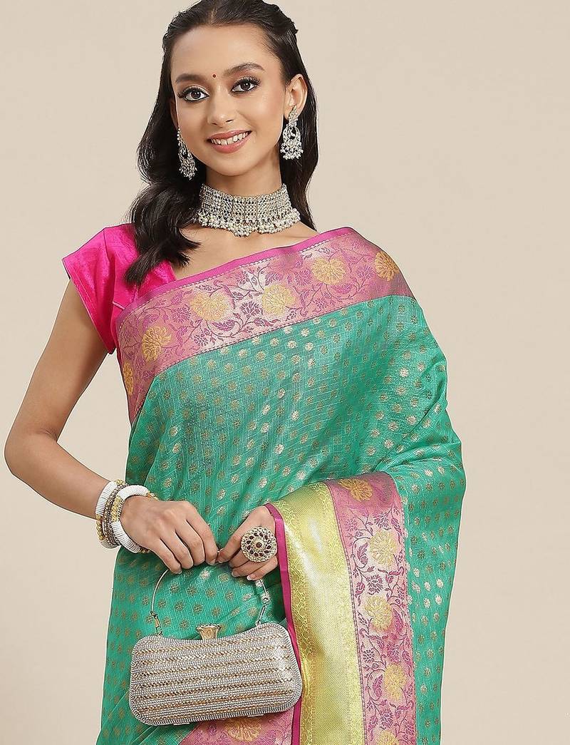 Green woven art silk traditional saree with blouse piece