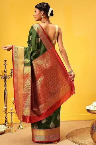 Green woven silk blend ethnic saree with blouse piece
