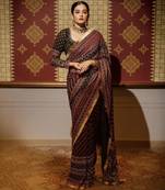 Maroon colour soft georgette mirror work saree
