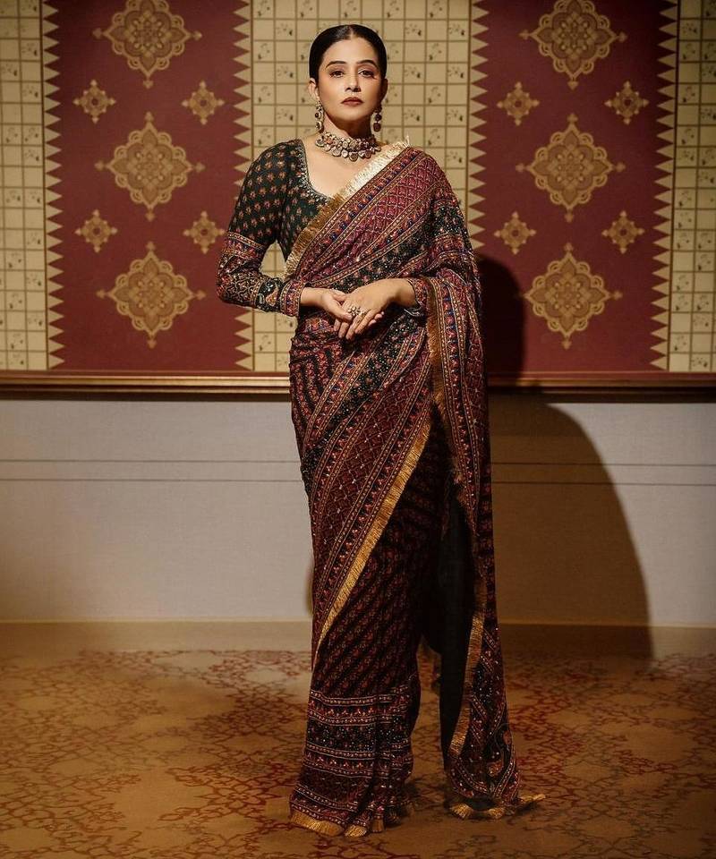 Maroon colour soft georgette mirror work saree