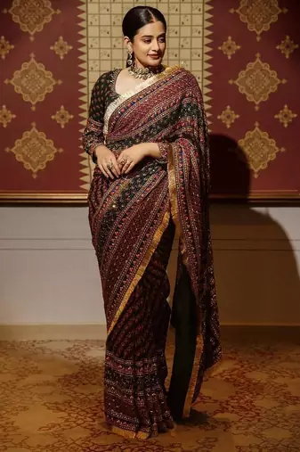 Maroon colour soft georgette mirror work saree