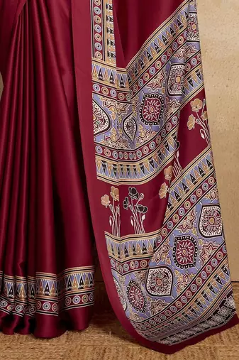 Maroon faux crepe printed patola-saris