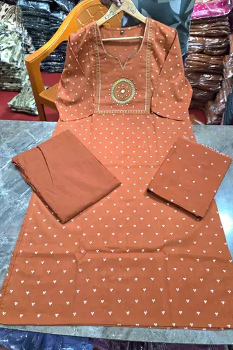 Beautiful rust kurti with plazzo and dupatta