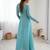 Powder blue colour georgette jacket style gown set with tassel tie-up