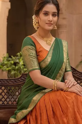 Vibrant Orange and Green Traditional Silk Lehenga Set with Intricate Zari Weaving