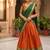 Vibrant Orange and Green Traditional Silk Lehenga Set with Intricate Zari Weaving