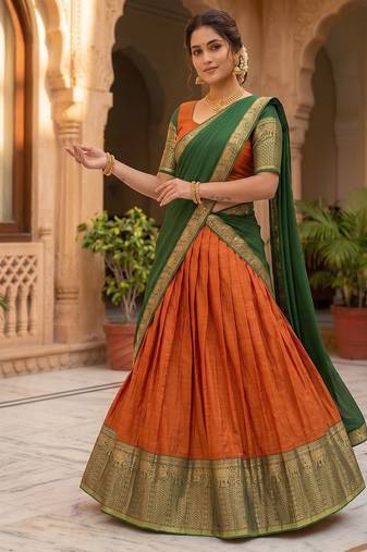 Vibrant Orange and Green Traditional Silk Lehenga Set with Intricate Zari Weaving