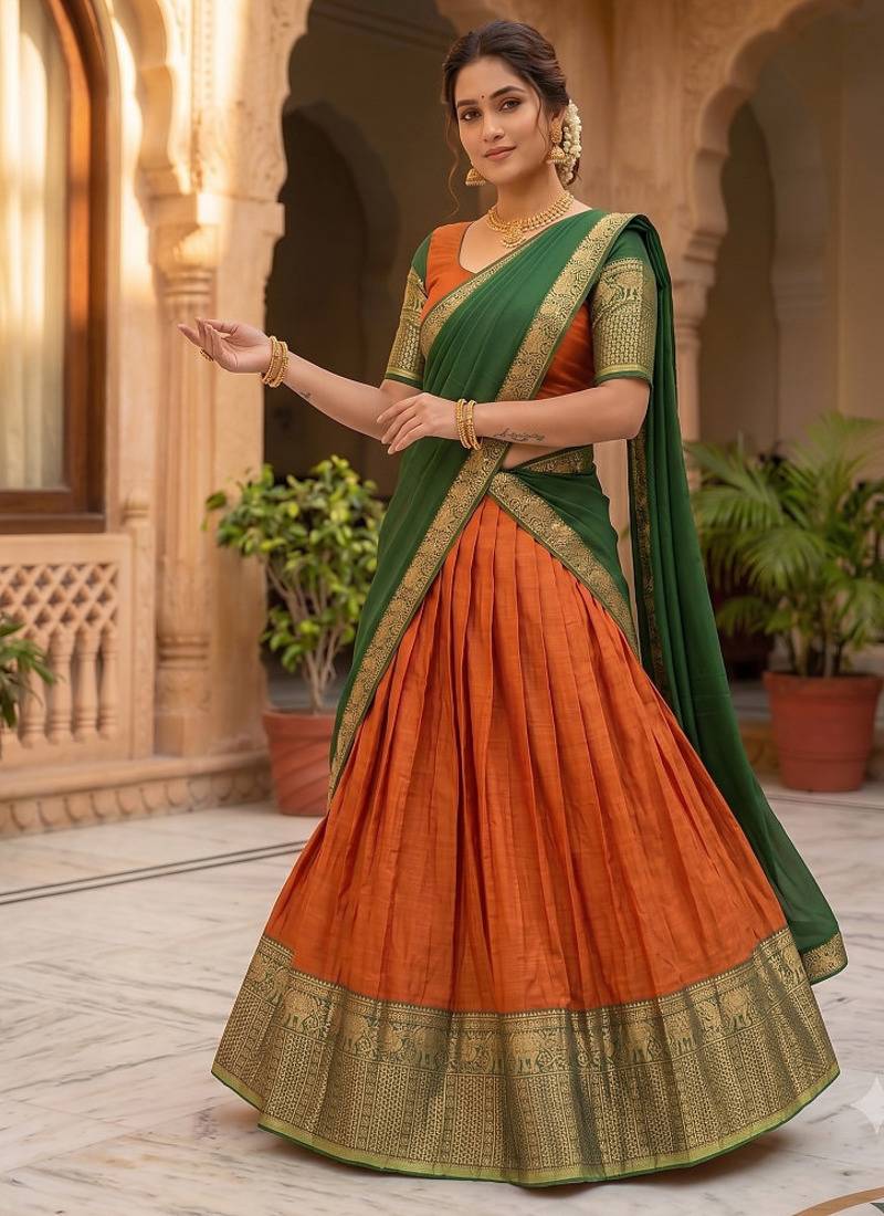Vibrant Orange and Green Traditional Silk Lehenga Set with Intricate Zari Weaving