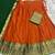 Vibrant Orange and Green Traditional Silk Lehenga Set with Intricate Zari Weaving