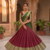 Elegant Wine and Bottle Green Traditional Silk Lehenga Set with Rich Zari Border