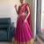 Festive Rani Pink Checkered Silk Lehenga Choli with Golden Zari Detail