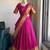 Festive Rani Pink Checkered Silk Lehenga Choli with Golden Zari Detail