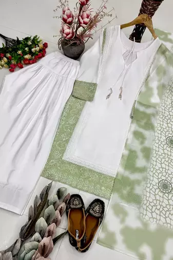 Lite green heavy natural silk party wear embroidery suit set