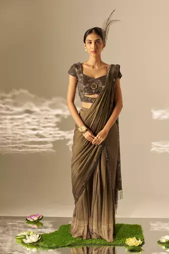 Muted olive green embroidered shimmer crepe pre draped saree set