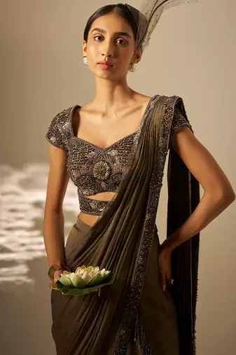 Muted olive green embroidered shimmer crepe pre draped saree set