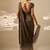 Muted olive green embroidered shimmer crepe pre draped saree set