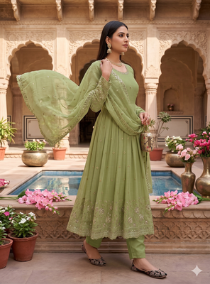 Elegant pista green embroidered anarkali kurta set with mirror work dupatta 3