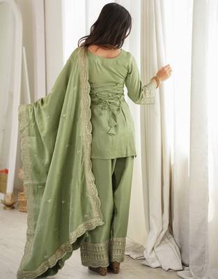 Women's sage green festive suit set with intricate embroidery 4