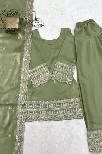 Women's sage green festive suit set with intricate embroidery