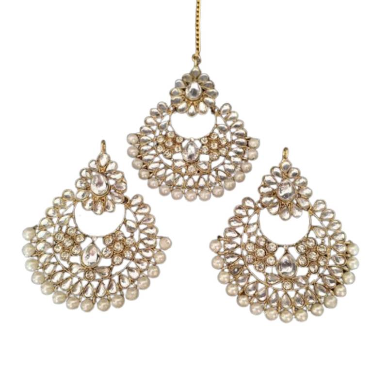 Gold stone studded floral rose gold pearls earrings with maang tikka sets for women
