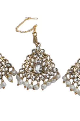  White stone studded and white pearl embellished earrings with maang tikka set for women