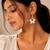 White star metallic drop earrings