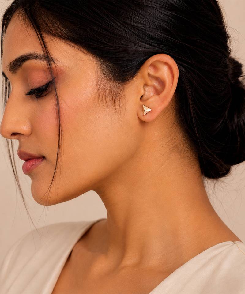 Gold plated metallic stud earrings