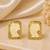 Off white stone metallic stud earrings