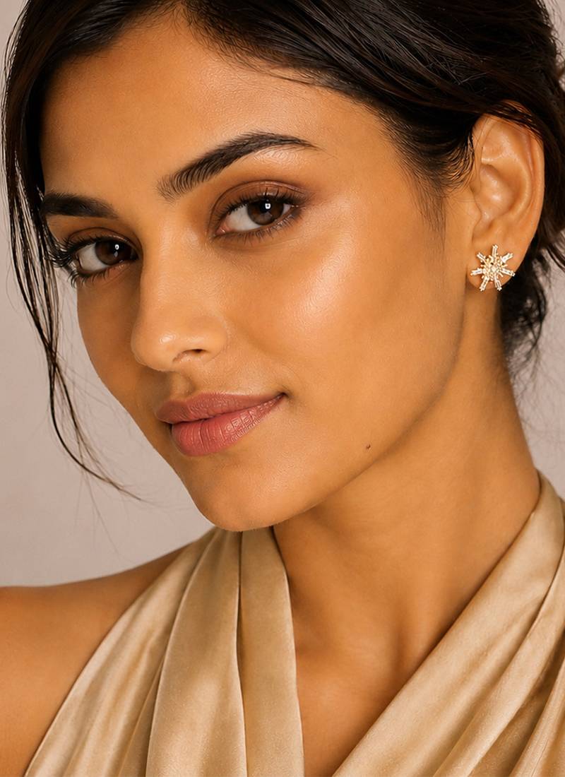 Gold plated metallic star stud earrings
